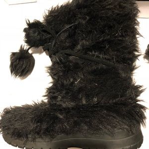 Colin Stuart fuzzy boots with pom poms